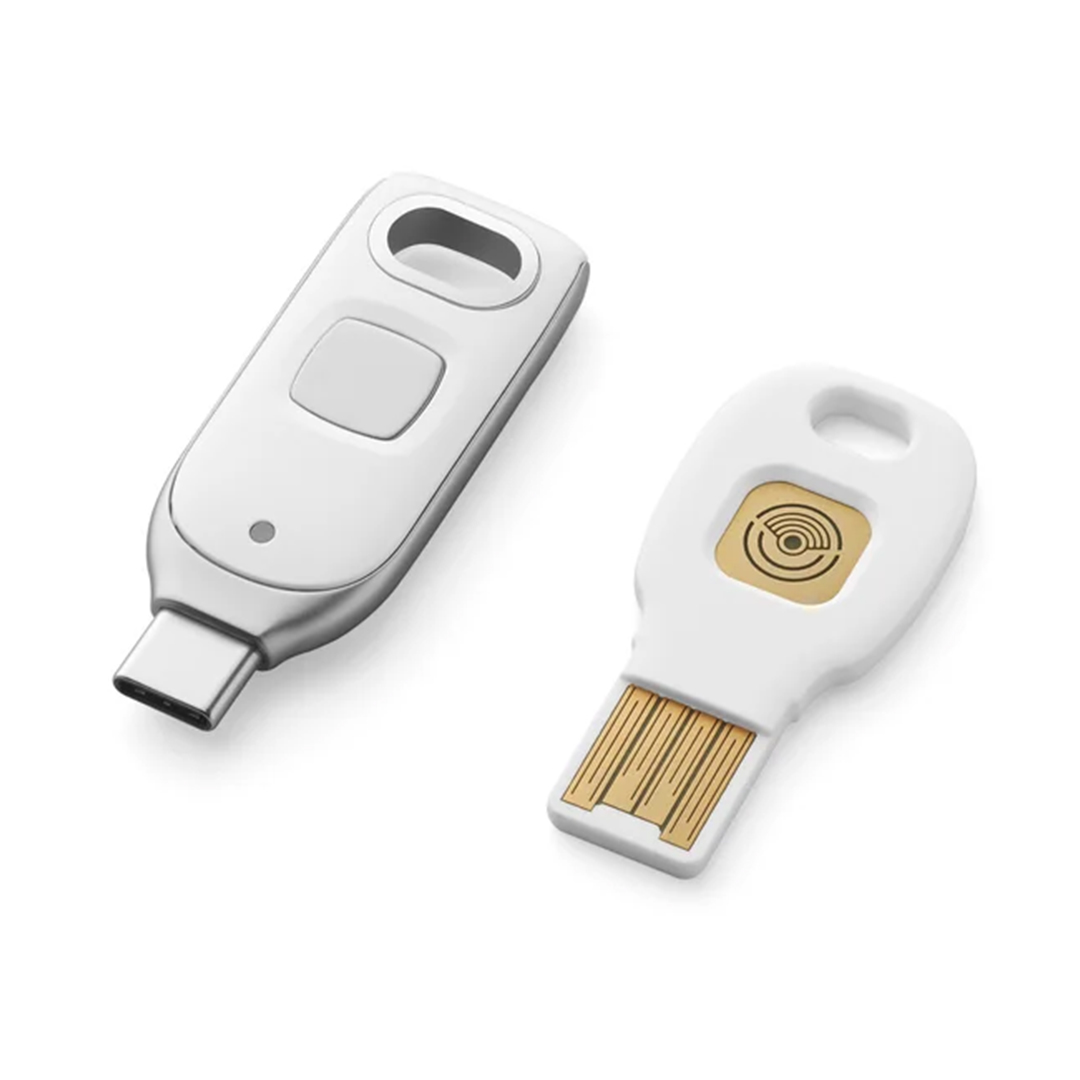 Picture of two new white and silver titan security keys