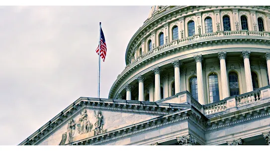U.S. Capitol building with American flag